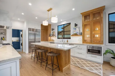 a kitchen with stainless steel appliances granite countertop counter space and a sink