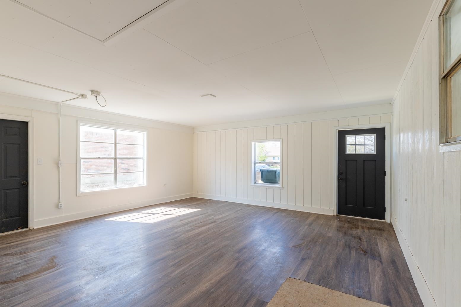 3268 Altruria Road Bartlett, TN 38134 - Photo 12 of 25 an empty room with wooden floor and windows