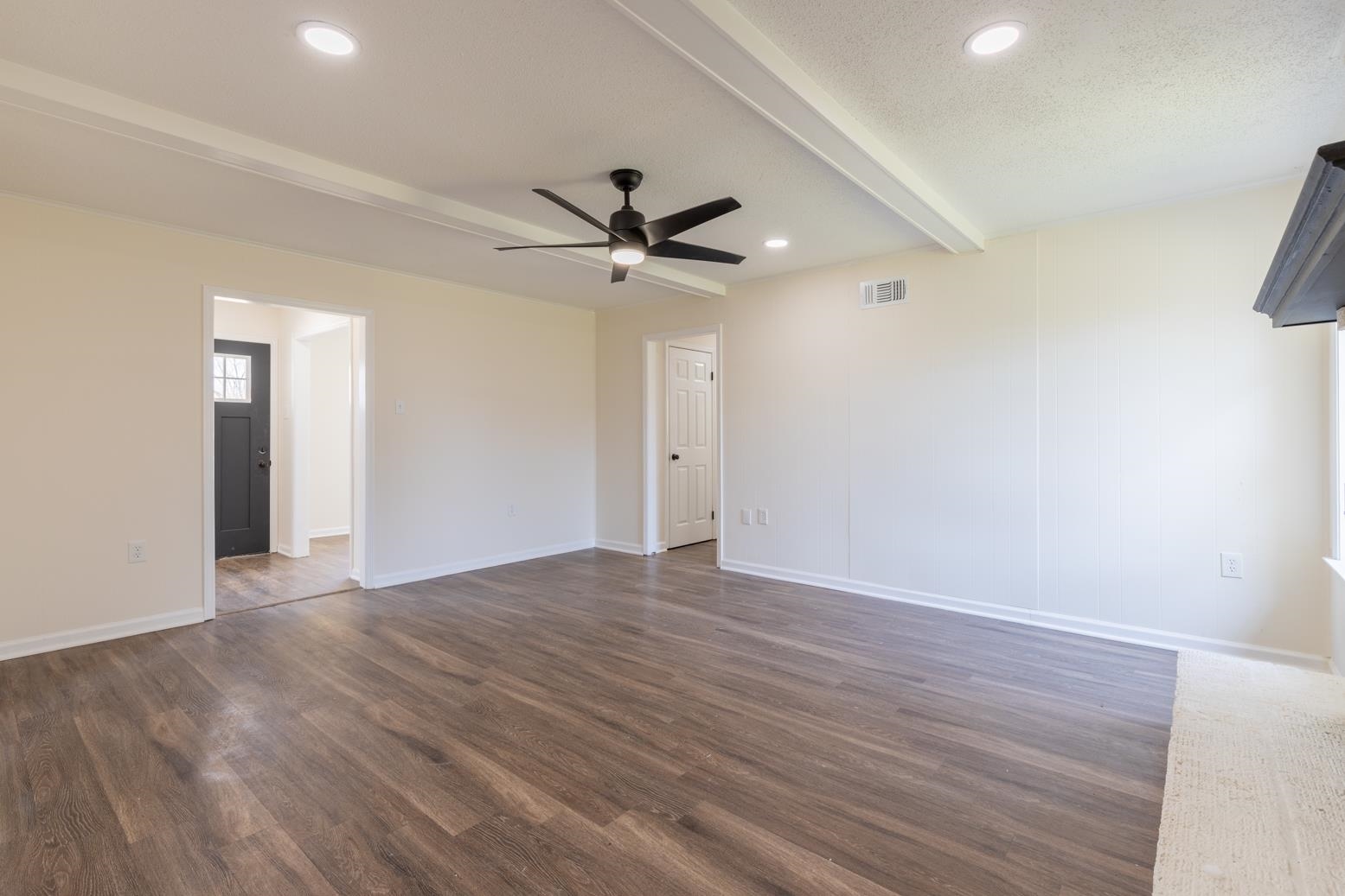 3268 Altruria Road Bartlett, TN 38134 - Photo 16 of 25 an empty room with wooden floor and ceiling fan