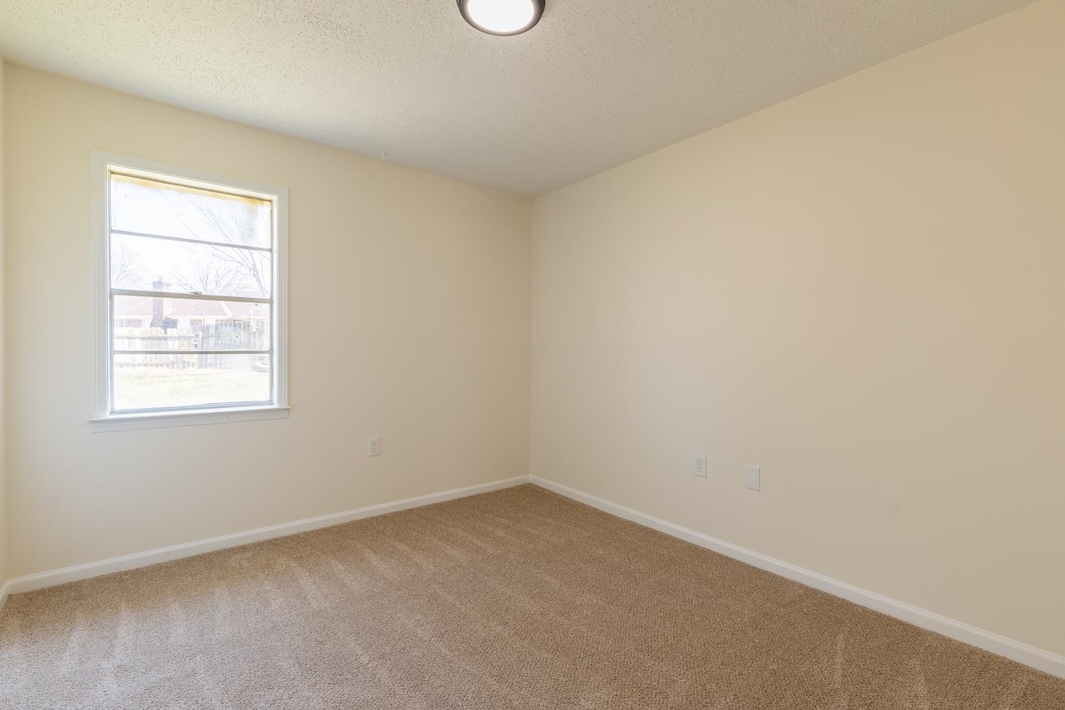 3268 Altruria Road Bartlett, TN 38134 - Photo 18 of 25 an empty room with a window