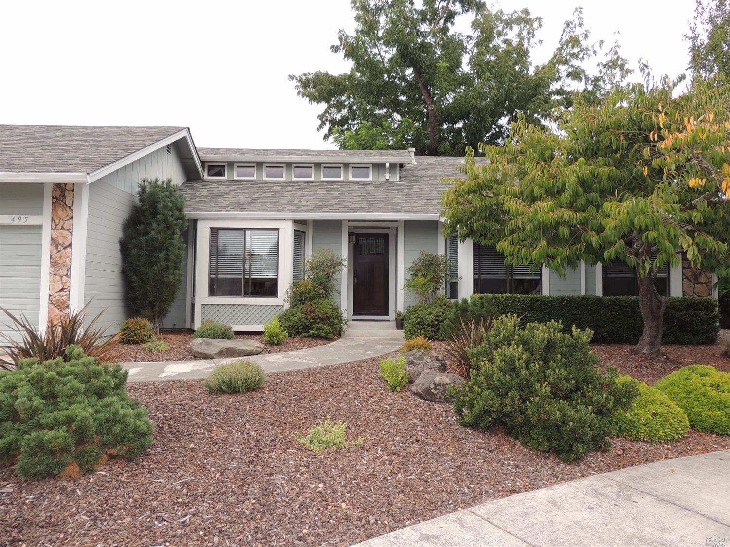 495 Ragle Court Sebastopol, CA 95472 - Photo 1 of 1 a front view of a house with a yard and potted plants