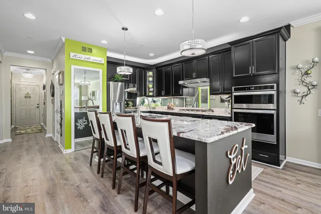 a view of a patio with a table chairs and a table