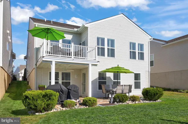 a view of a tables and chairs on a patio