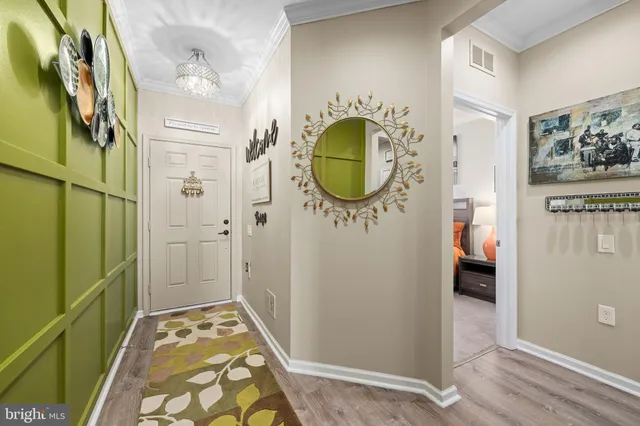 a bathroom with a granite countertop sink toilet a large mirror a bathtub and shower