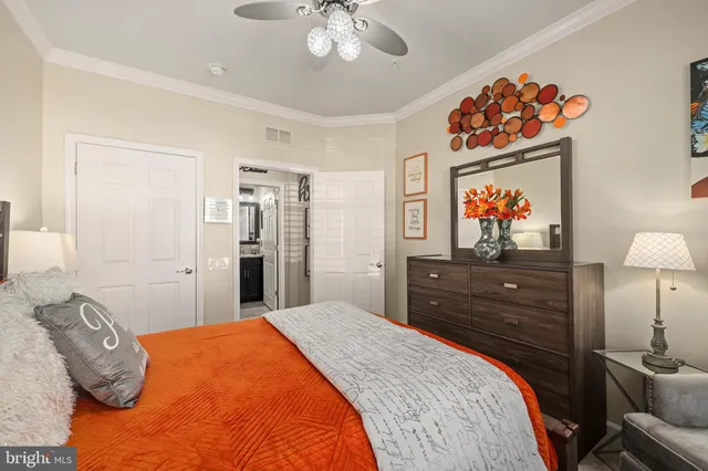 a kitchen with stainless steel appliances granite countertop a sink a stove and a wooden floors