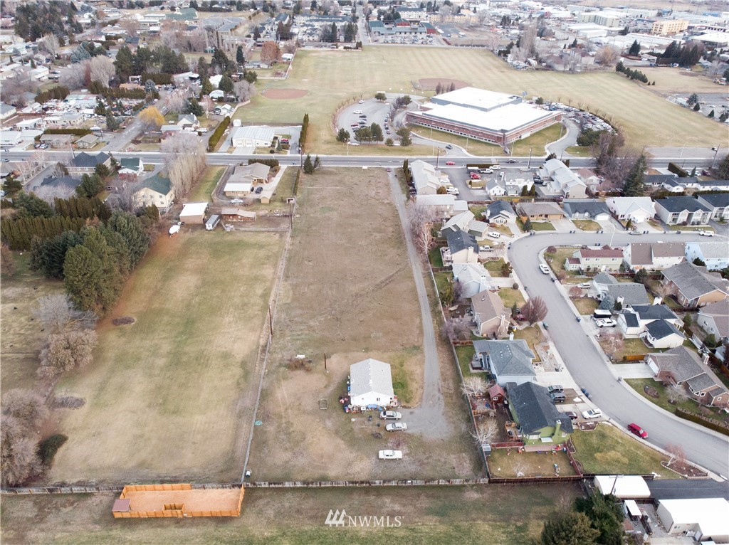 1415 Maple Street Wenatchee, WA 98801 - Photo 4 of 12 an aerial view of residential houses with outdoor space