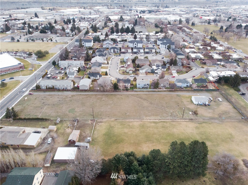 1415 Maple Street Wenatchee, WA 98801 - Photo 7 of 12 an aerial view of residential houses with outdoor space