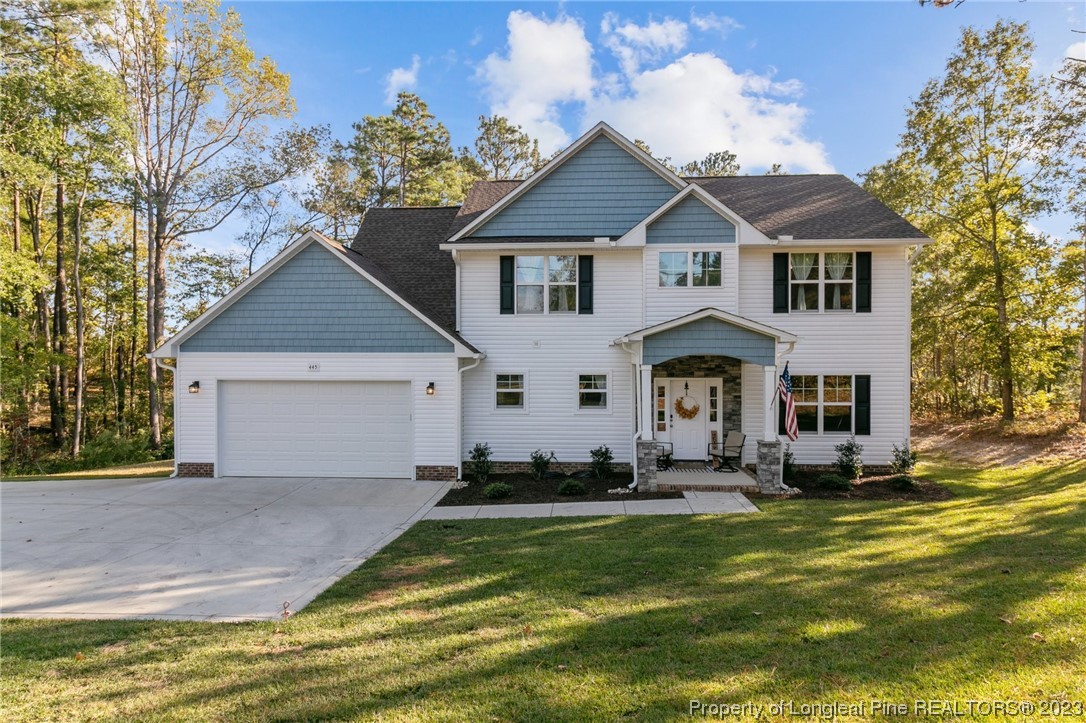 445 Myra Road Raeford, NC 28376 - Photo 1 of 45 a front view of a house with a yard
