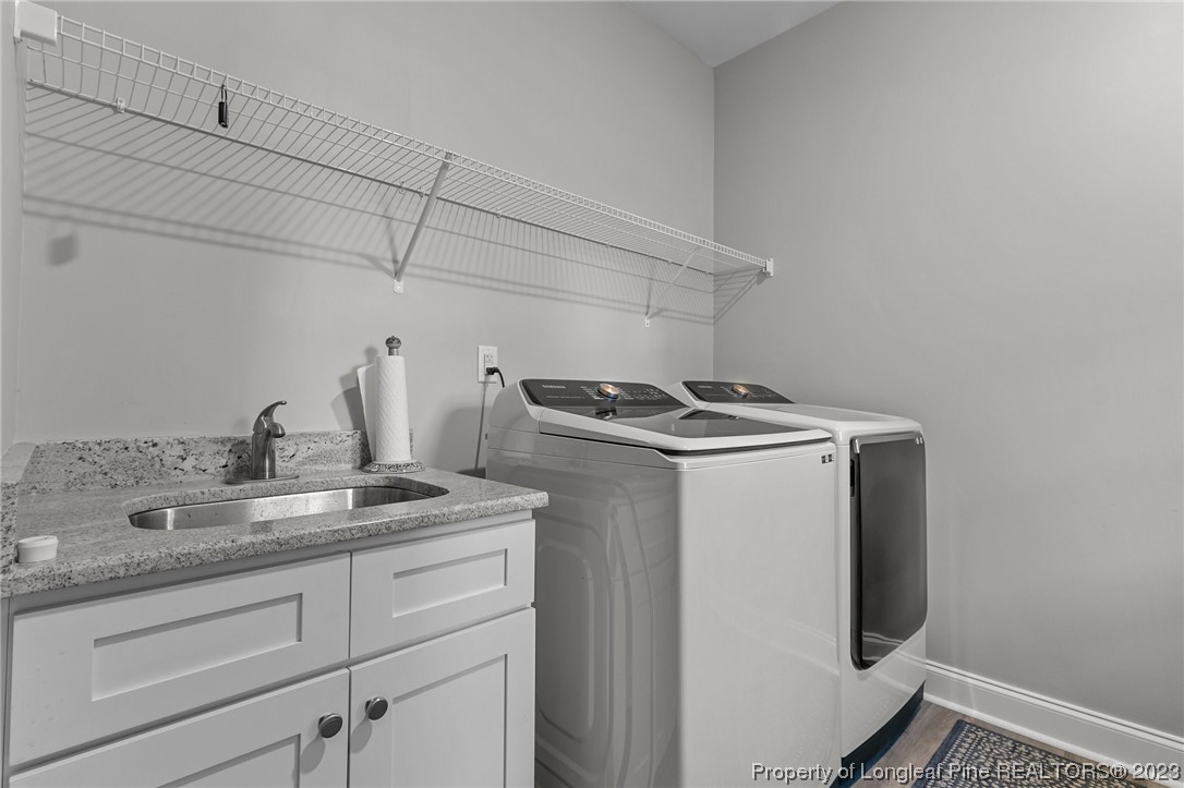 445 Myra Road Raeford, NC 28376 - Photo 20 of 45 a room with storage and utility
