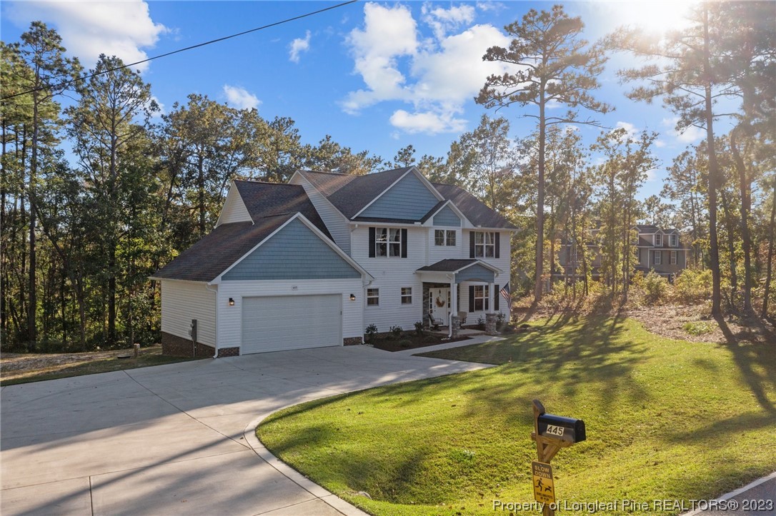 445 Myra Road Raeford, NC 28376 - Photo 3 of 45 a front view of a house with a yard