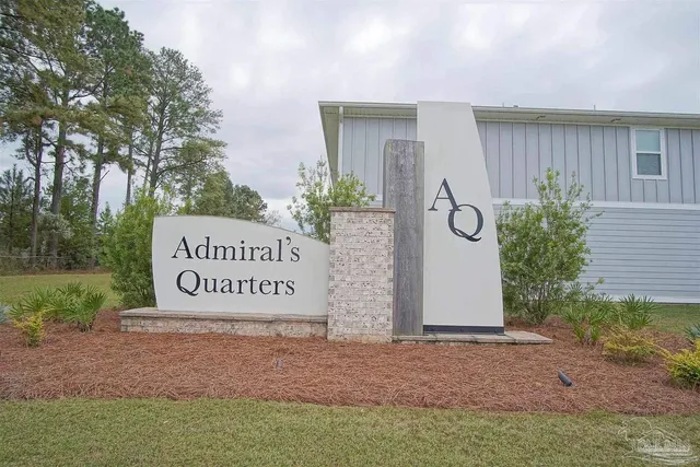 a sign broad on the side of the road