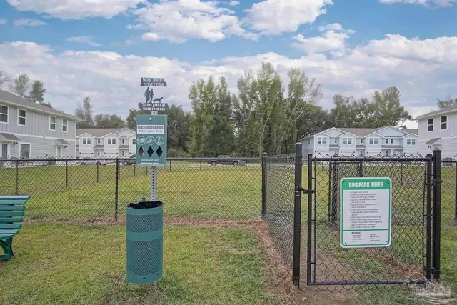 a view of a street with sitting area