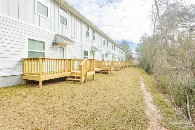 a front view of a house with a outdoor space