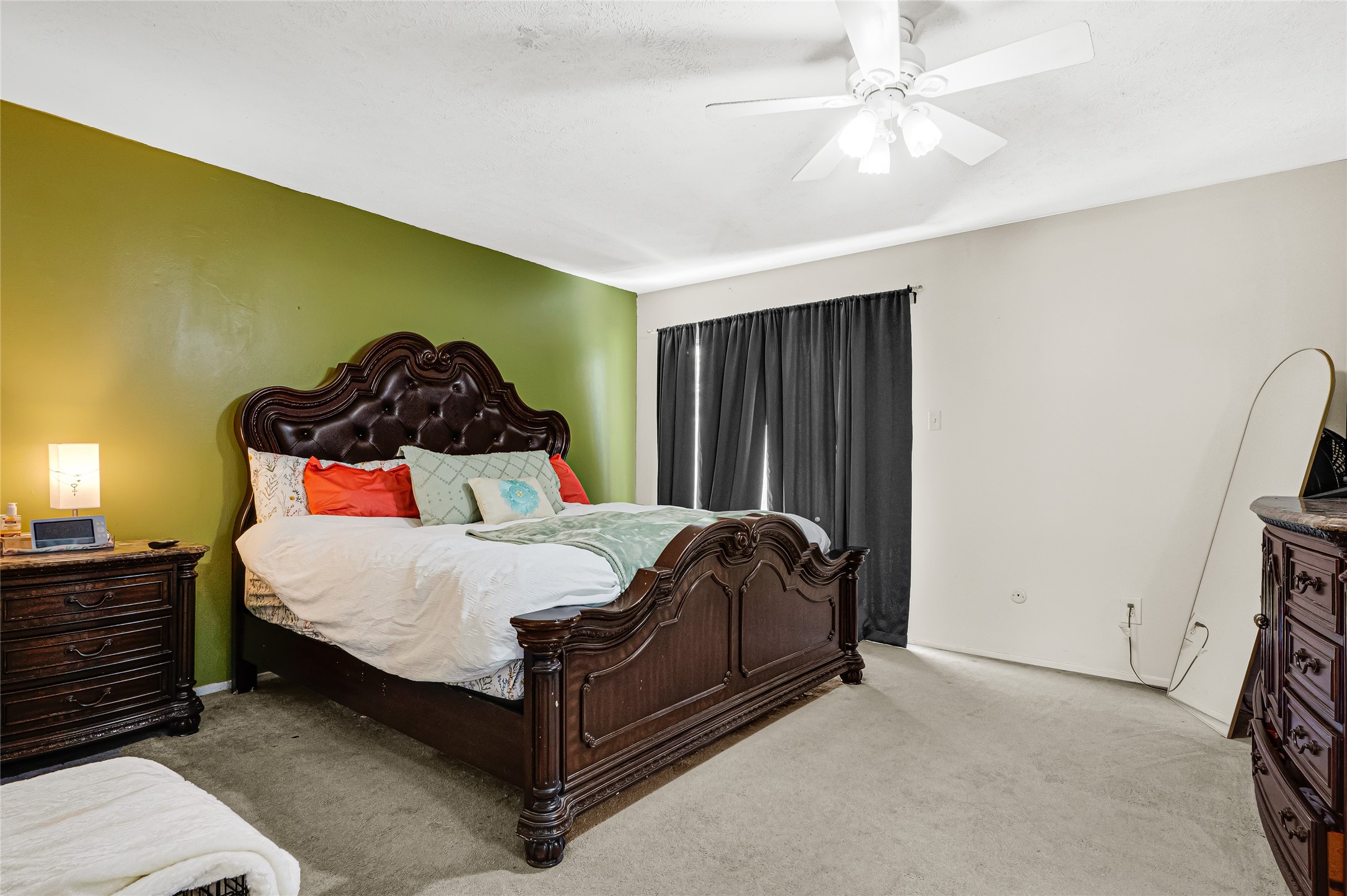 23419 Bayleaf Drive Spring, TX 77373 - Photo 18 of 23 Primary bedroom with sliding glass doors to covered patio.