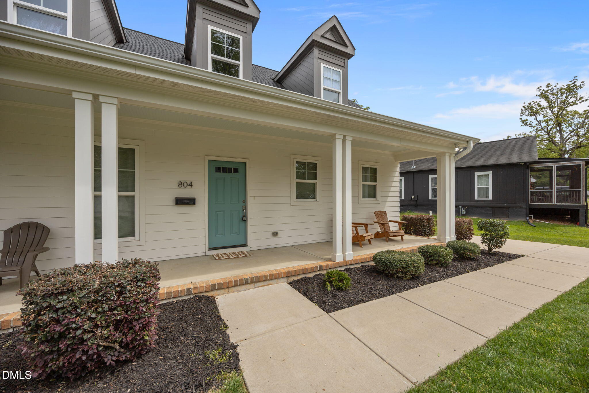 804 Hartford Road Raleigh, NC 27610 - Photo 23 of 26 a front view of a house with garden