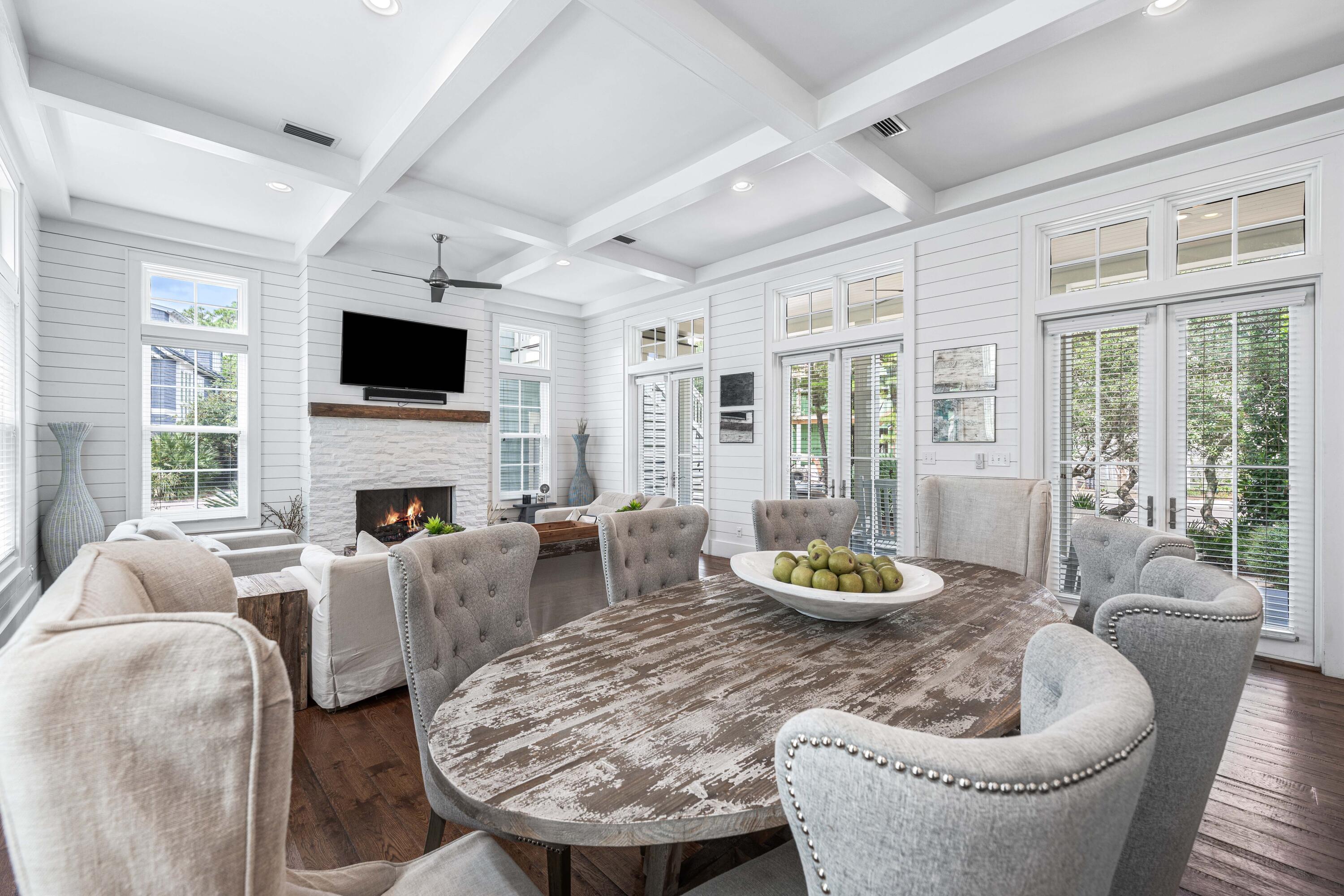 34 North Watch Tower Lane Inlet Beach, FL 32461 - Photo 11 of 90 a living room with furniture a fireplace and a flat screen tv