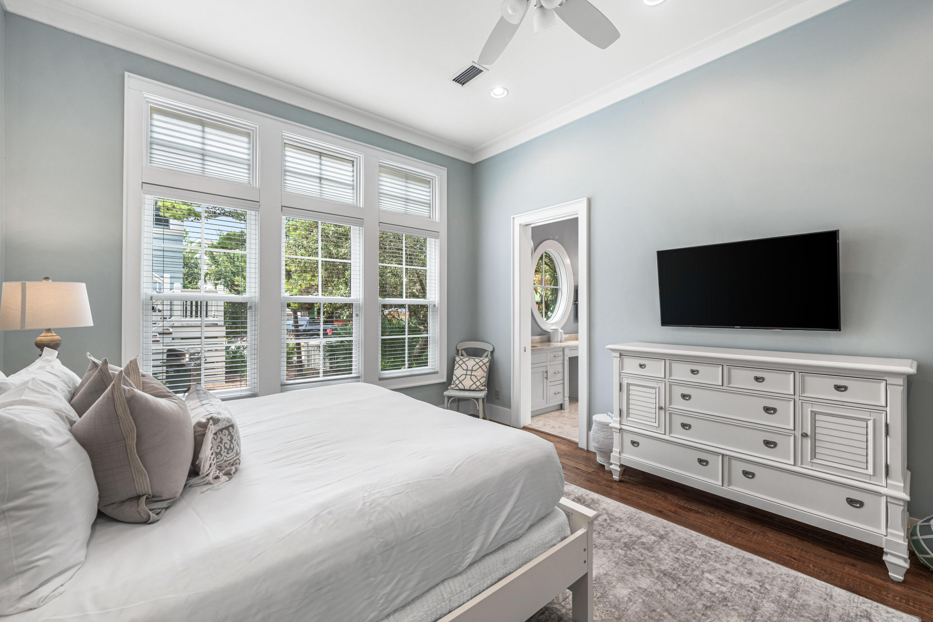 34 North Watch Tower Lane Inlet Beach, FL 32461 - Photo 24 of 90 a spacious bedroom with a large bed a flat tv screen and a dresser