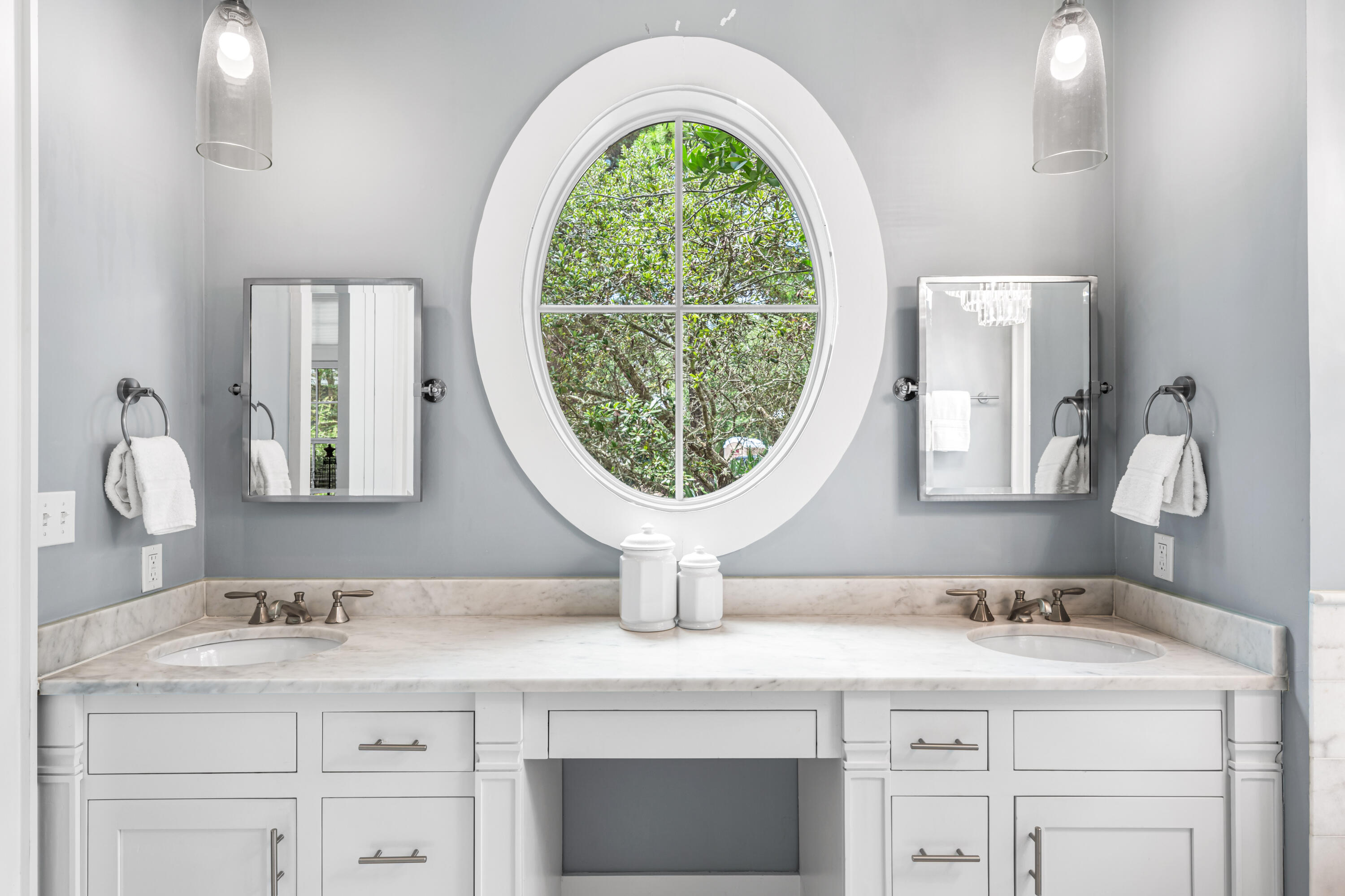 34 North Watch Tower Lane Inlet Beach, FL 32461 - Photo 32 of 90 a bathroom with a granite countertop toilet a sink and a mirror