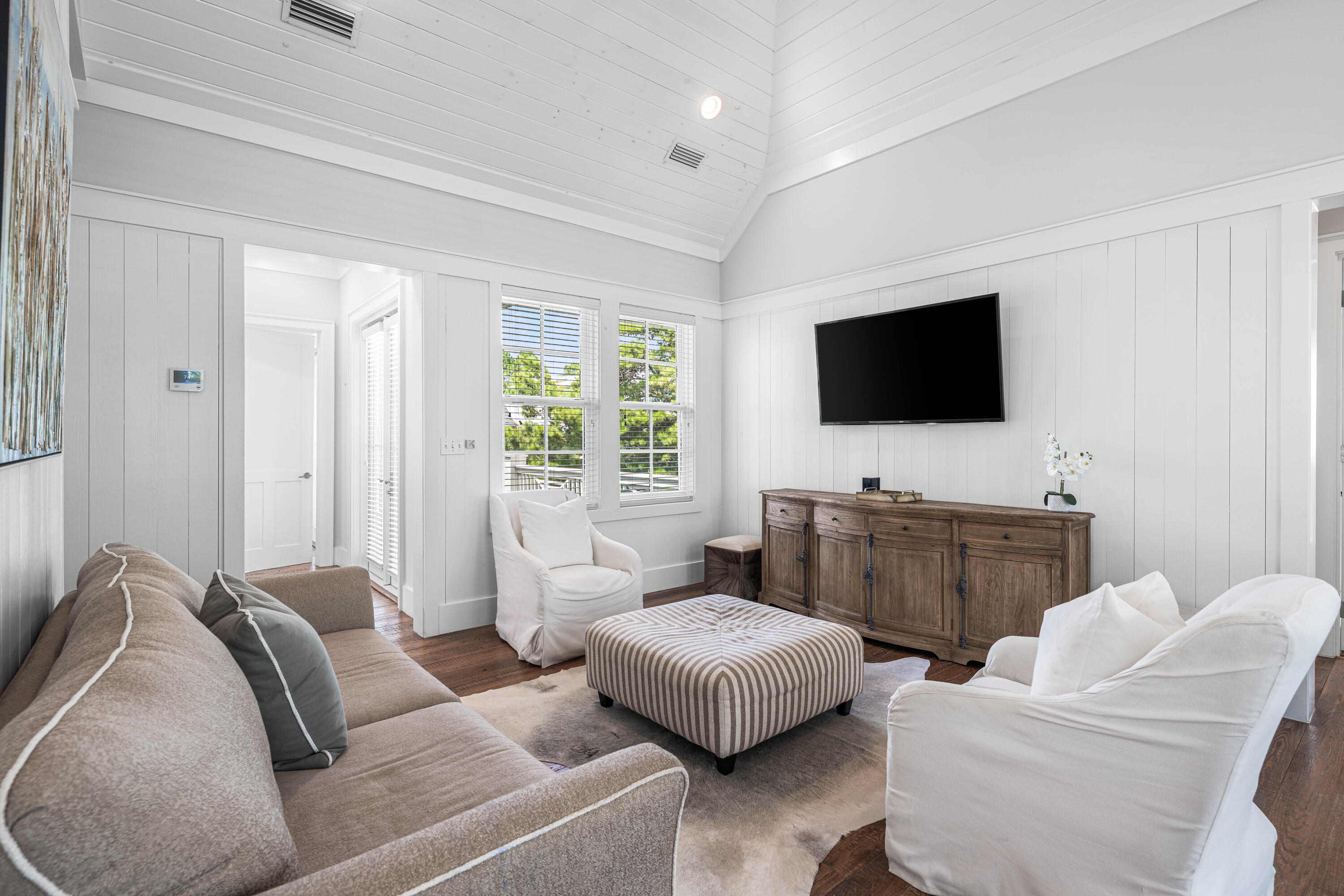 34 North Watch Tower Lane Inlet Beach, FL 32461 - Photo 41 of 90 a living room with furniture and a flat screen tv