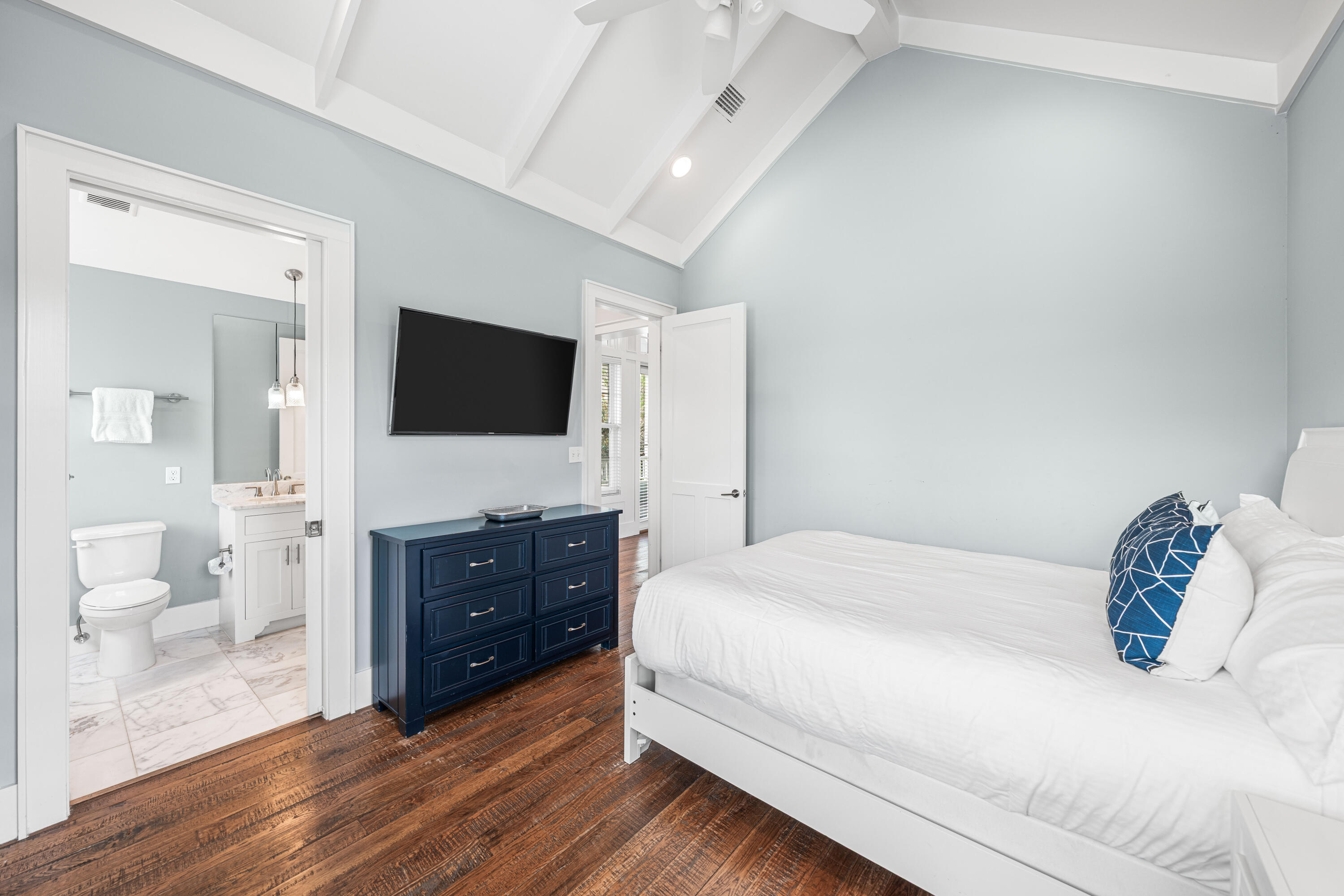 34 North Watch Tower Lane Inlet Beach, FL 32461 - Photo 46 of 90 a bedroom with a bed and a flat screen tv