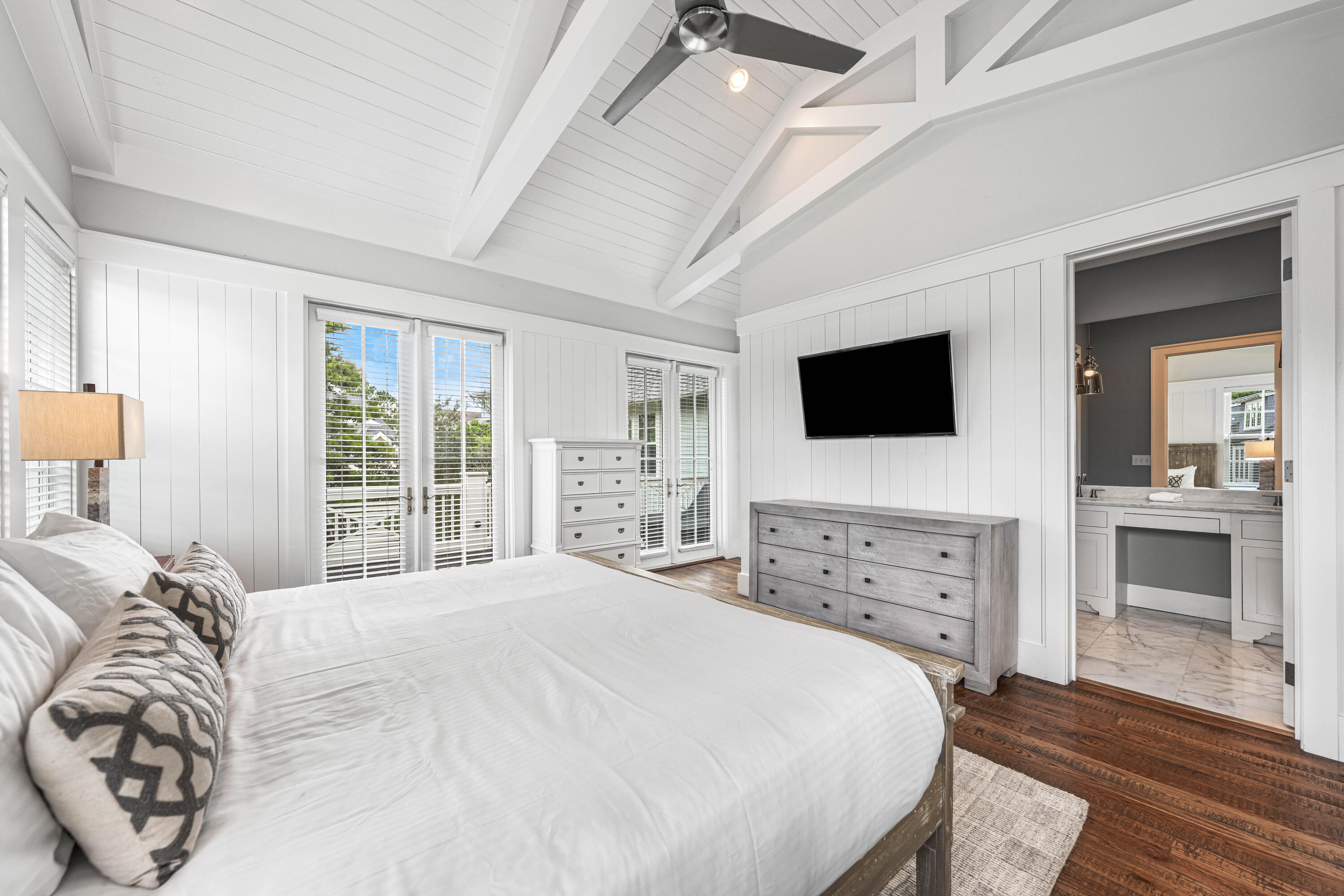 34 North Watch Tower Lane Inlet Beach, FL 32461 - Photo 54 of 90 a bedroom with a bed and a flat screen tv