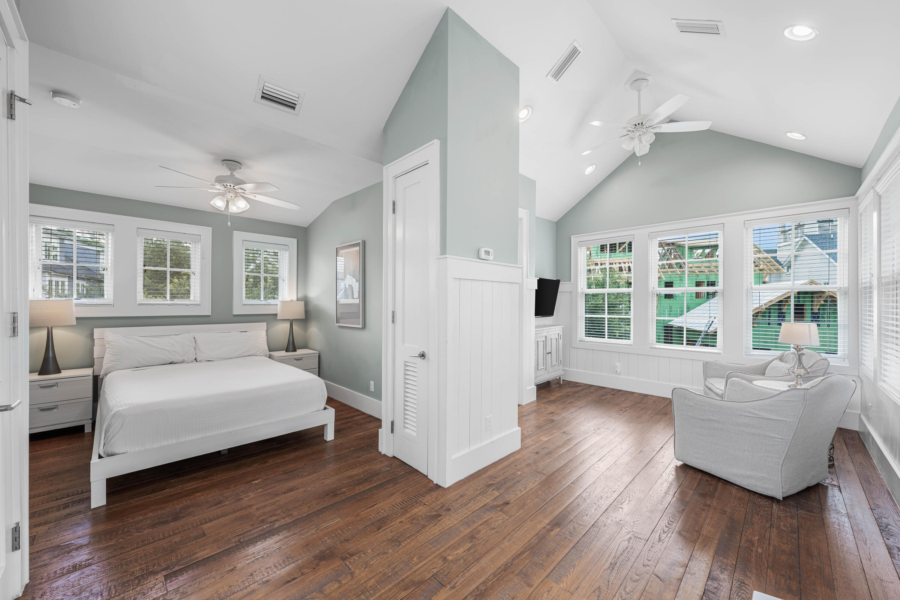 34 North Watch Tower Lane Inlet Beach, FL 32461 - Photo 63 of 90 a spacious bedroom with a large bed wooden floor and windows