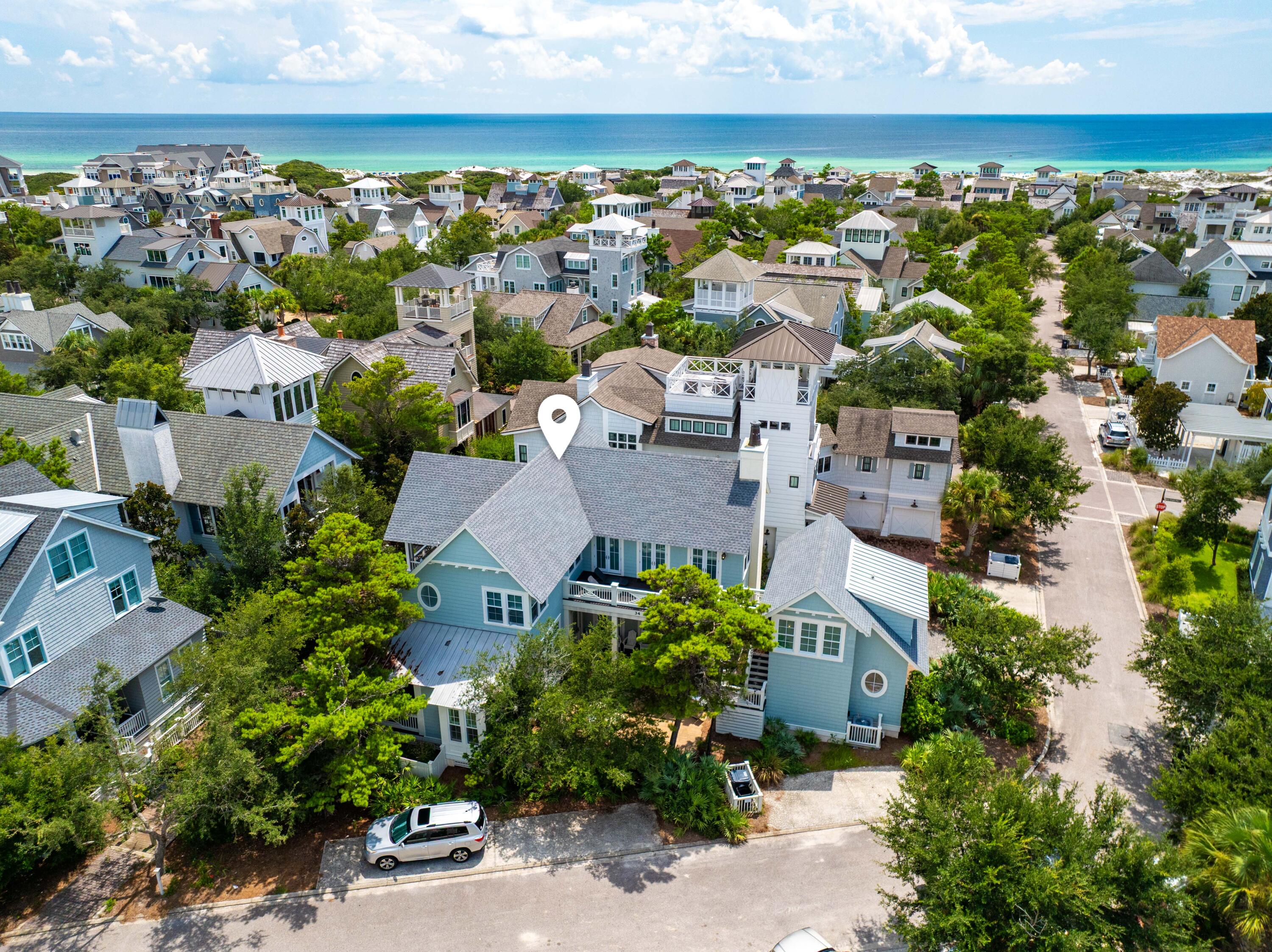 34 North Watch Tower Lane Inlet Beach, FL 32461 - Photo 78 of 90 an aerial view of a city with lots of residential buildings ocean and mountain view in back