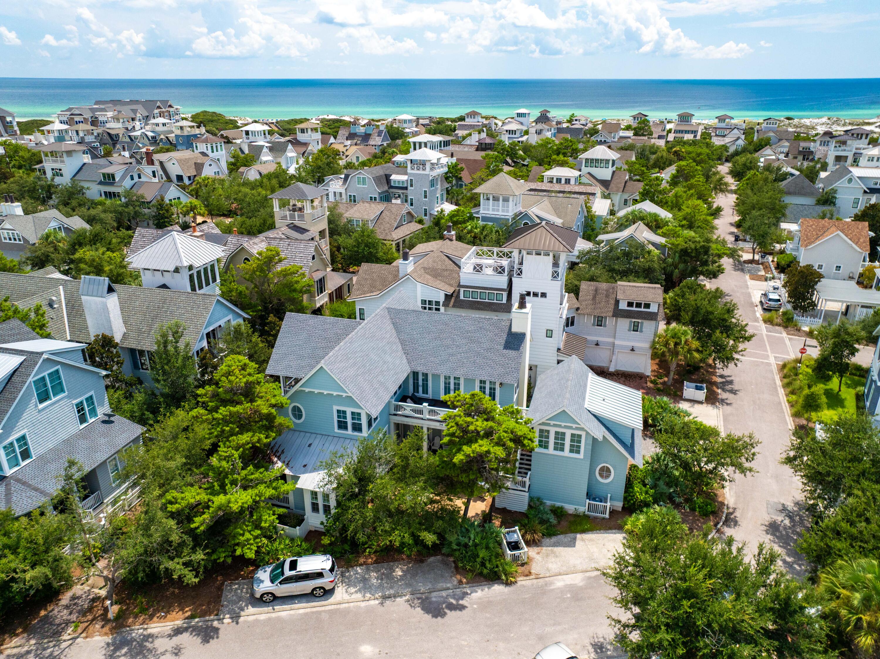 34 North Watch Tower Lane Inlet Beach, FL 32461 - Photo 83 of 90 an aerial view of a city with lots of residential buildings ocean and mountain view in back