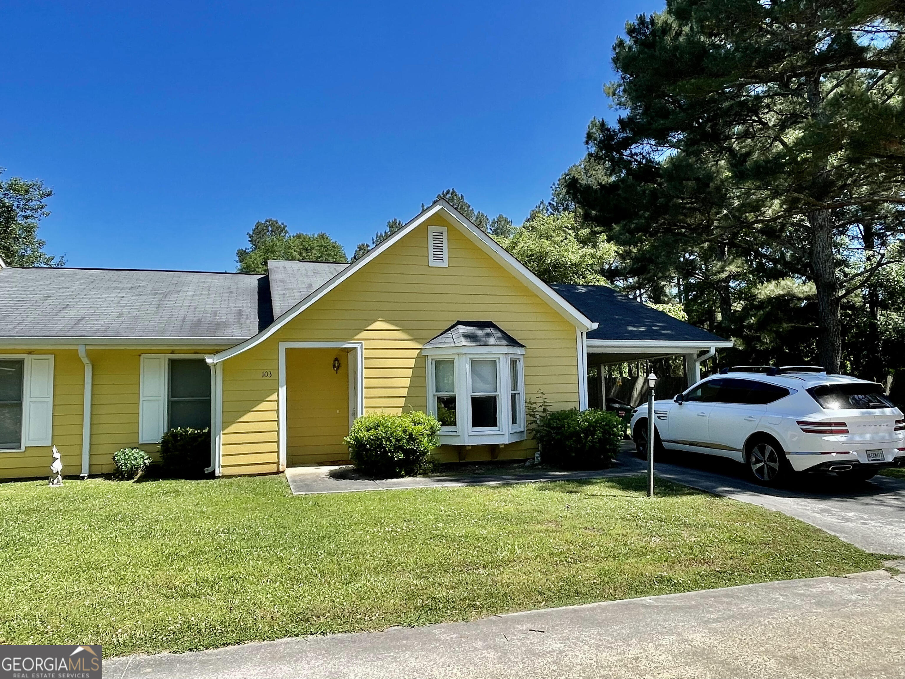 103 Villas Lane Rome, GA 30165 - Photo 1 of 1 a front view of a house with a garden