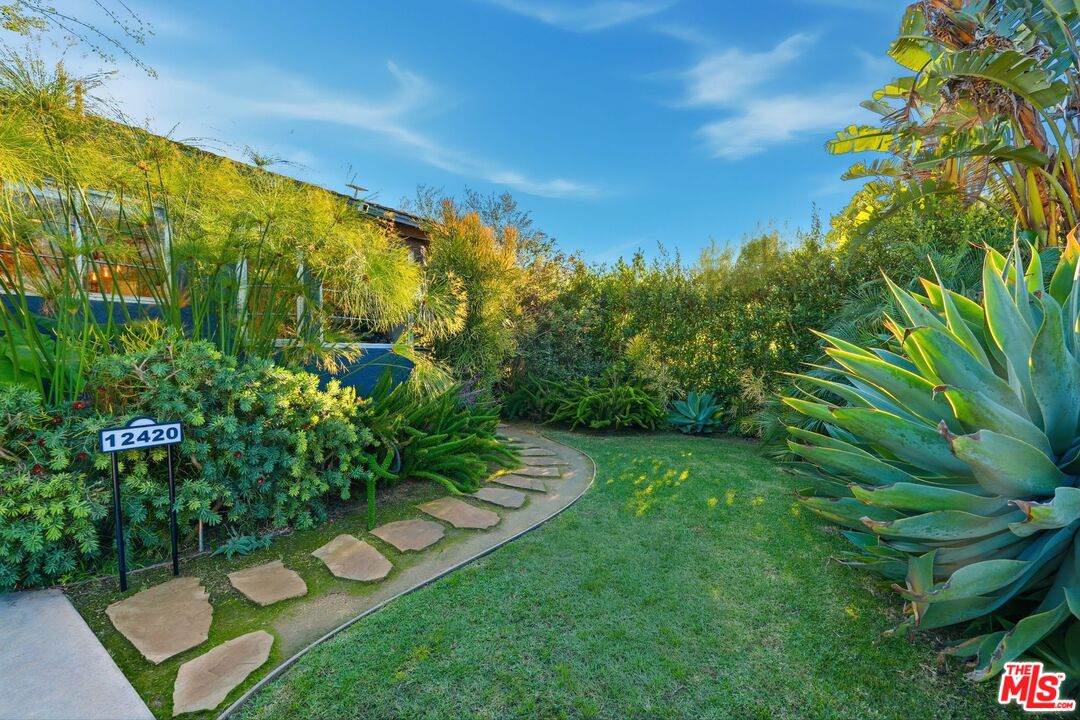 12420 Barbara Avenue Los Angeles, CA 90066 - Photo 2 of 40 a view of a garden with an outdoor seating