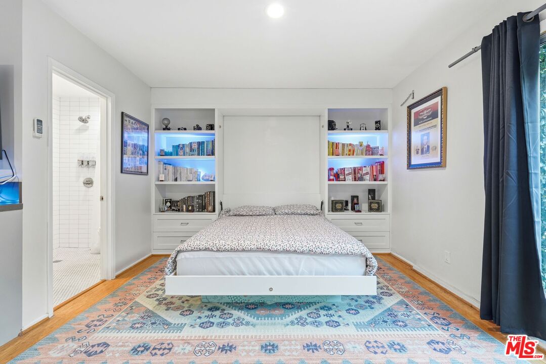 12420 Barbara Avenue Los Angeles, CA 90066 - Photo 23 of 40 a bedroom with a bed and a dresser