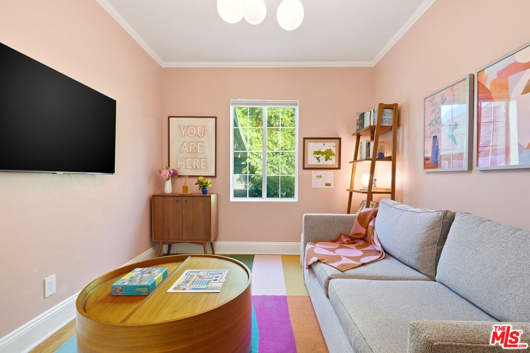 12420 Barbara Avenue Los Angeles, CA 90066 - Photo 30 of 40 a living room with furniture and a flat screen tv