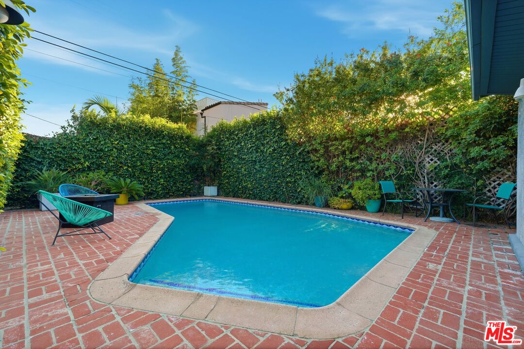 12420 Barbara Avenue Los Angeles, CA 90066 - Photo 32 of 40 a view of a swimming pool with a patio