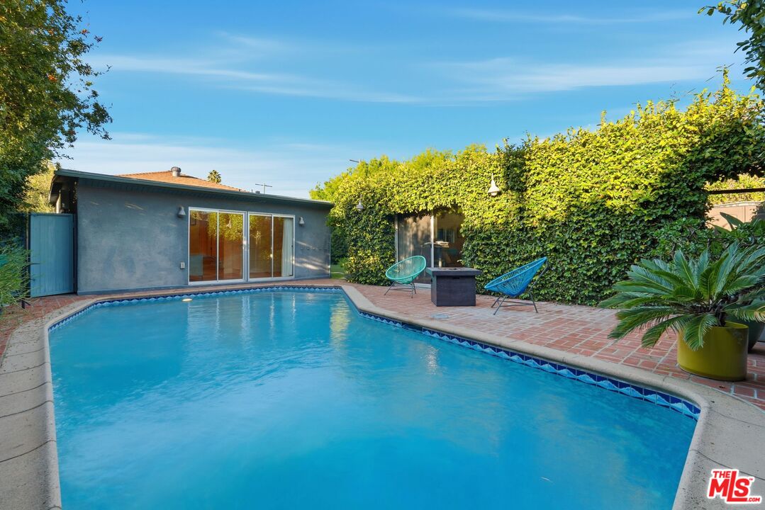 12420 Barbara Avenue Los Angeles, CA 90066 - Photo 33 of 40 a view of a swimming pool with an outdoor space