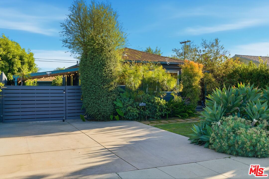 12420 Barbara Avenue Los Angeles, CA 90066 - Photo 39 of 40 a view of a pathway both side of house