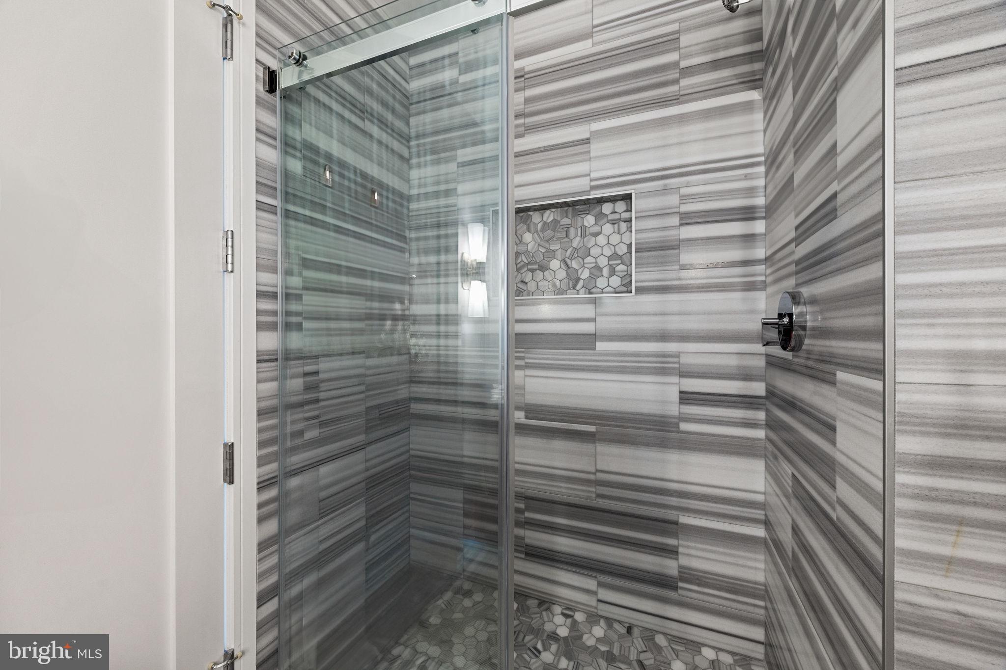 1414 South Penn Square, Unit 22B Philadelphia, PA 19102 - Photo 16 of 37 Kelly Wearstler- Ann Saks Marble Guest Showers