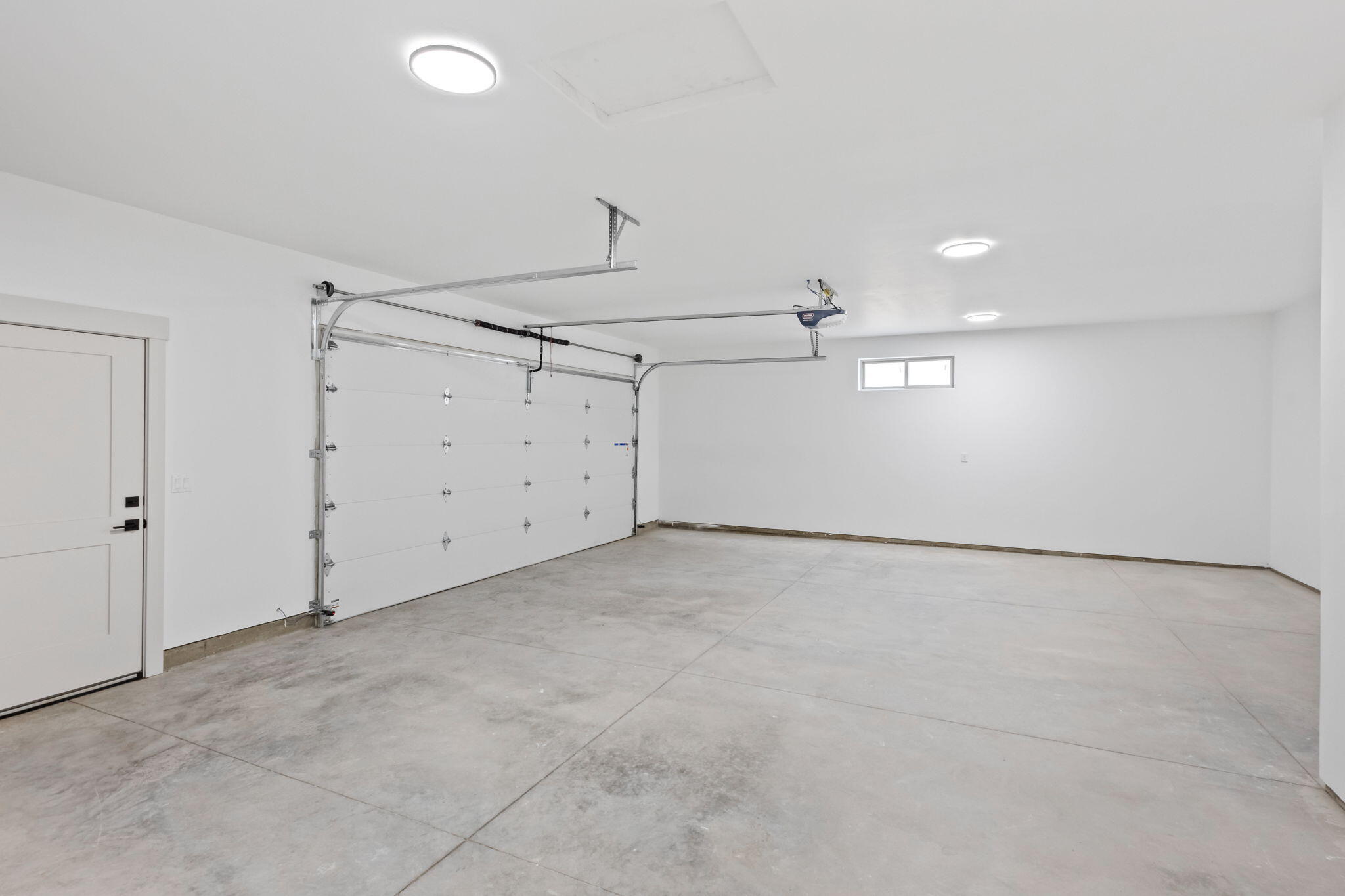 19018 Baker Road, Unit LOT 51 Bend, OR 97702 - Photo 19 of 26 Oversized garage with workshop and storage area