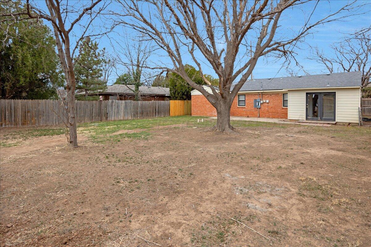 1415 Southwest 34th Avenue Amarillo, TX 79109 - Photo 20 of 22 a house with trees in front of it