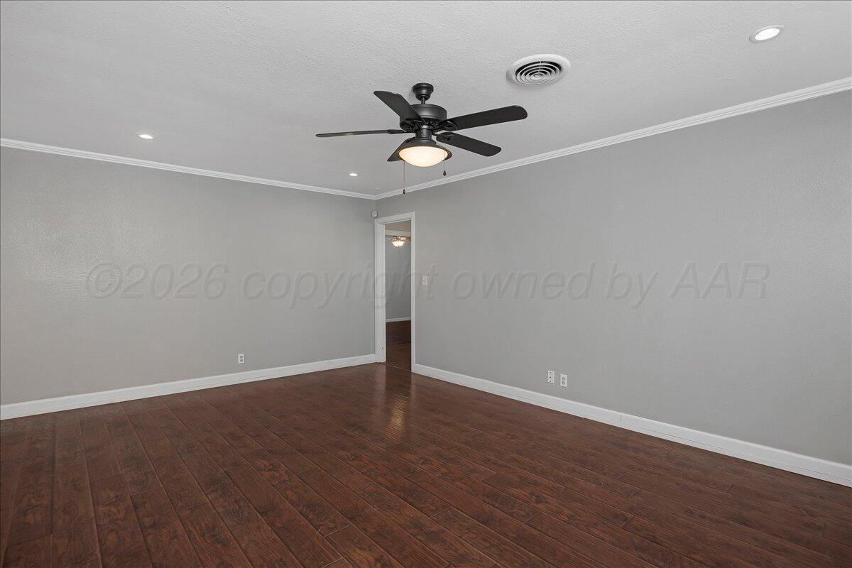 1415 Southwest 34th Avenue Amarillo, TX 79109 - Photo 4 of 22 a view of a room with wooden floor