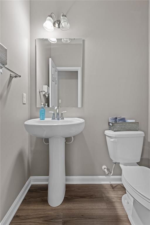 217 Lockheed Drive Coraopolis, PA 15108 - Photo 14 of 27 a bathroom with a toilet sink and mirror