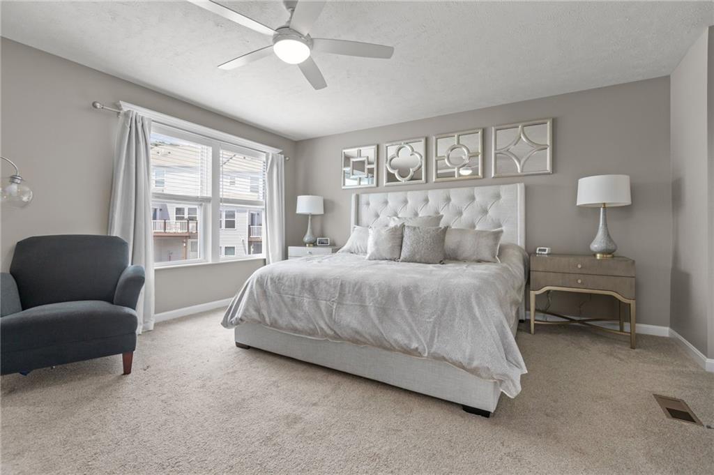 217 Lockheed Drive Coraopolis, PA 15108 - Photo 15 of 27 a bedroom with a bed and a couch