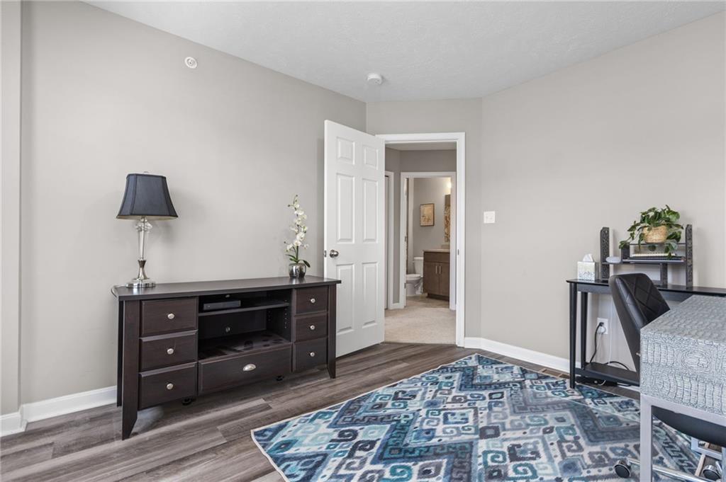 217 Lockheed Drive Coraopolis, PA 15108 - Photo 23 of 27 a view of a workspace space with furniture and wooden floor