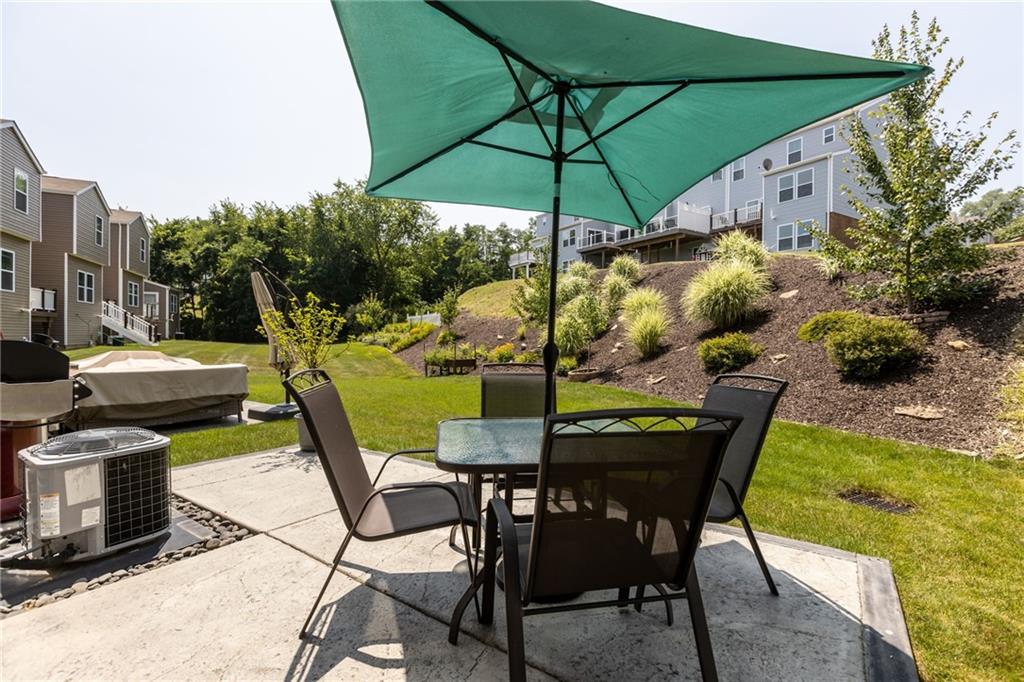 217 Lockheed Drive Coraopolis, PA 15108 - Photo 27 of 27 a patio with a yard table and chairs
