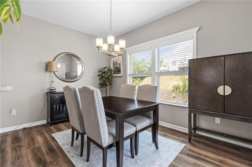 217 Lockheed Drive Coraopolis, PA 15108 - Photo 6 of 27 a view of a dining room with furniture window and wooden floor