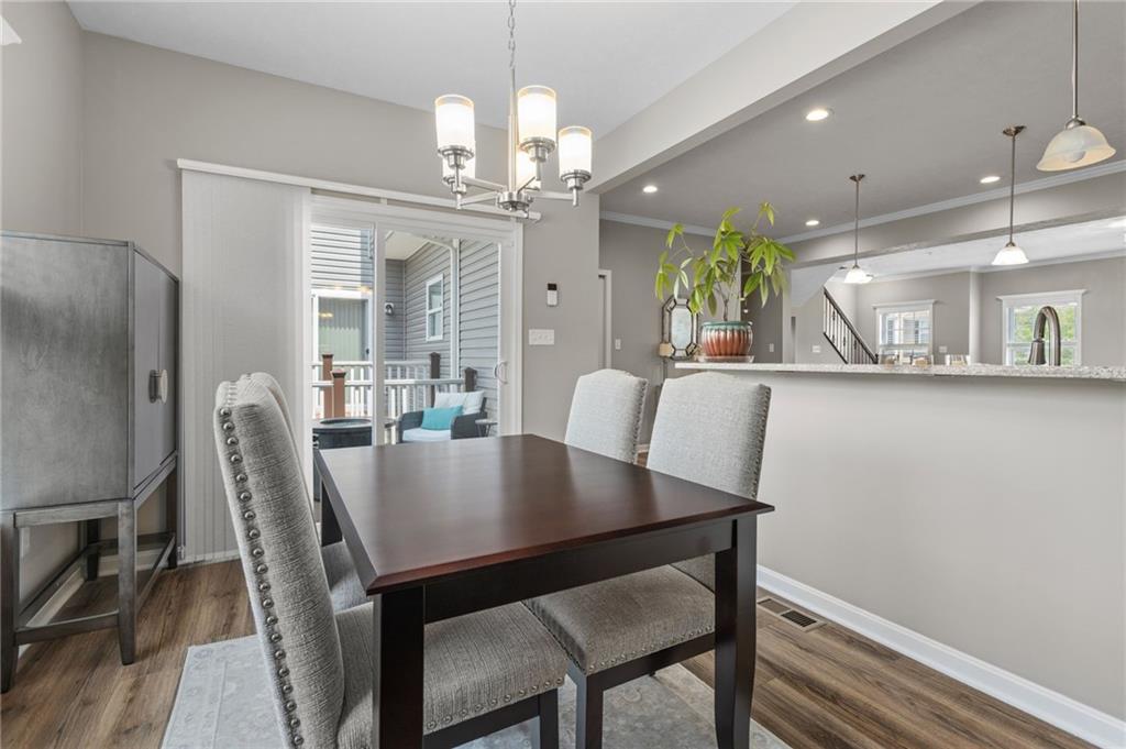 217 Lockheed Drive Coraopolis, PA 15108 - Photo 7 of 27 a view of a dining room with furniture and a chandelier