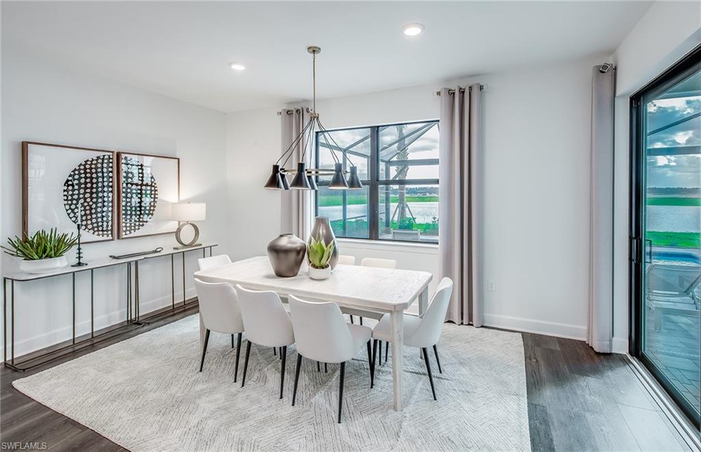 19061 Gentry Place Estero, FL 33928 - Photo 11 of 49 a view of a dining room with furniture window and outside view