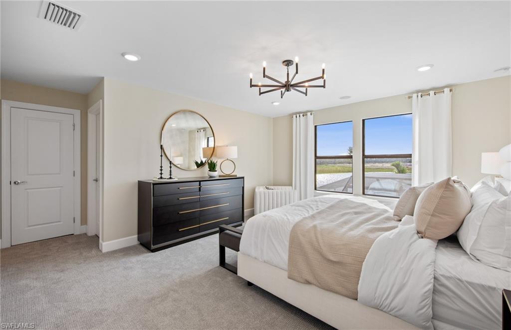 19061 Gentry Place Estero, FL 33928 - Photo 28 of 49 a bedroom with a bed and a dresser