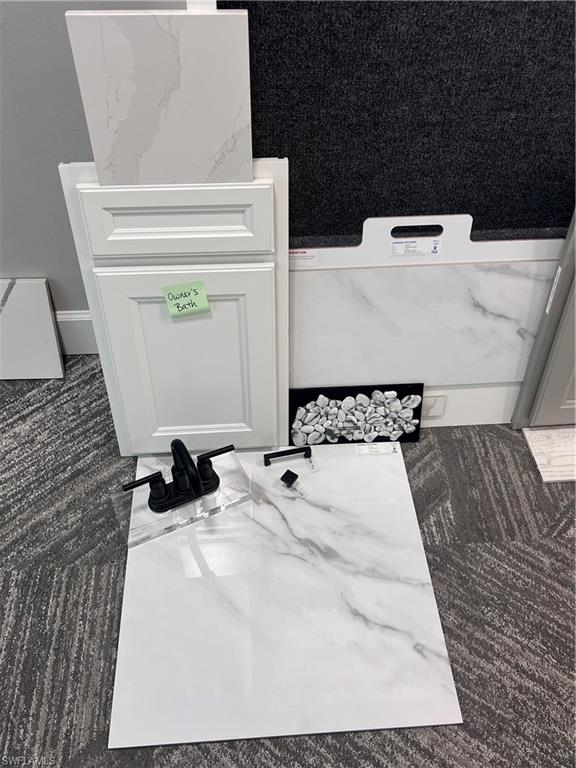 19061 Gentry Place Estero, FL 33928 - Photo 29 of 49 a bathroom with a bathtub