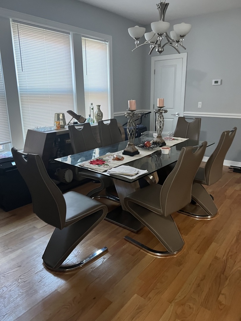 7826 South Morgan Street Chicago, IL 60620 - Photo 9 of 16 a living room with furniture and a table