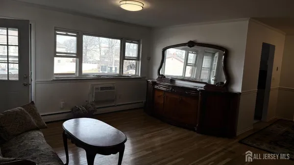 a kitchen with stainless steel appliances granite countertop a stove a refrigerator and a microwave oven